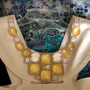 White dress with beautiful jeweled neckline